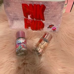 2 small body sprays and a small bag